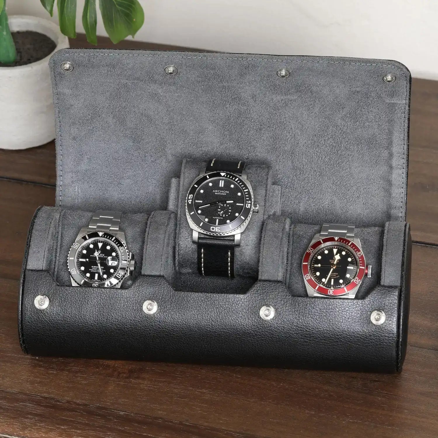 Three-watch travel case.