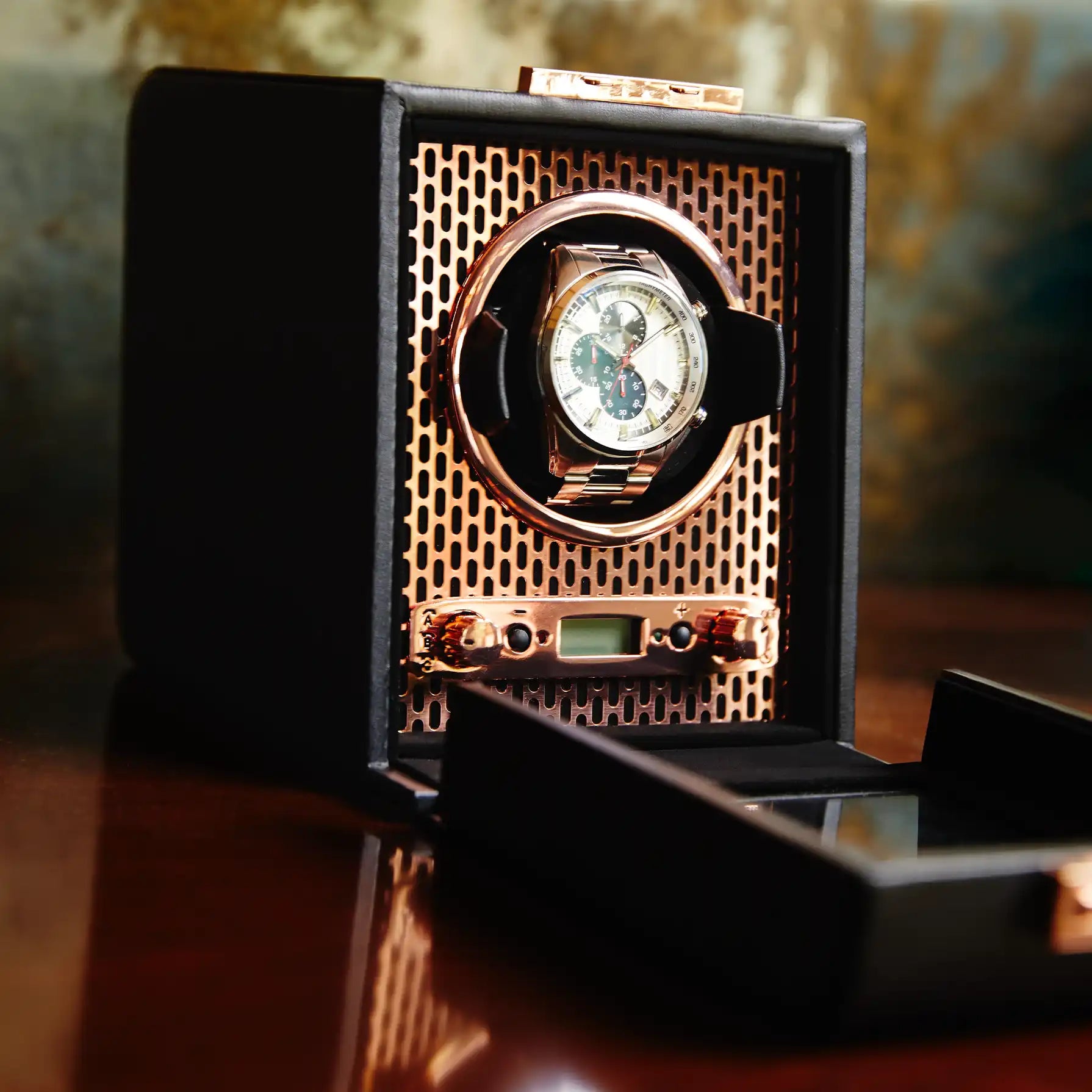 Automatic watch winder with a watch.