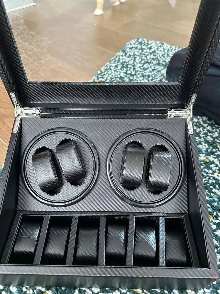 Black carbon fiber watch winder and storage box.