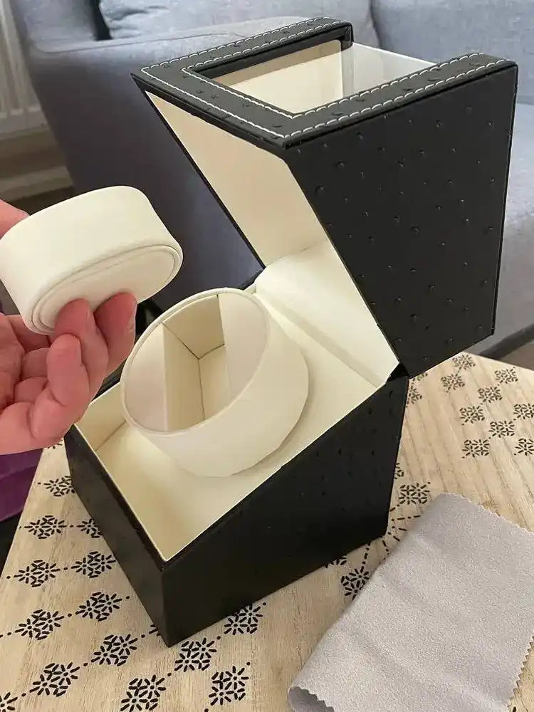 Black leather watch winder.