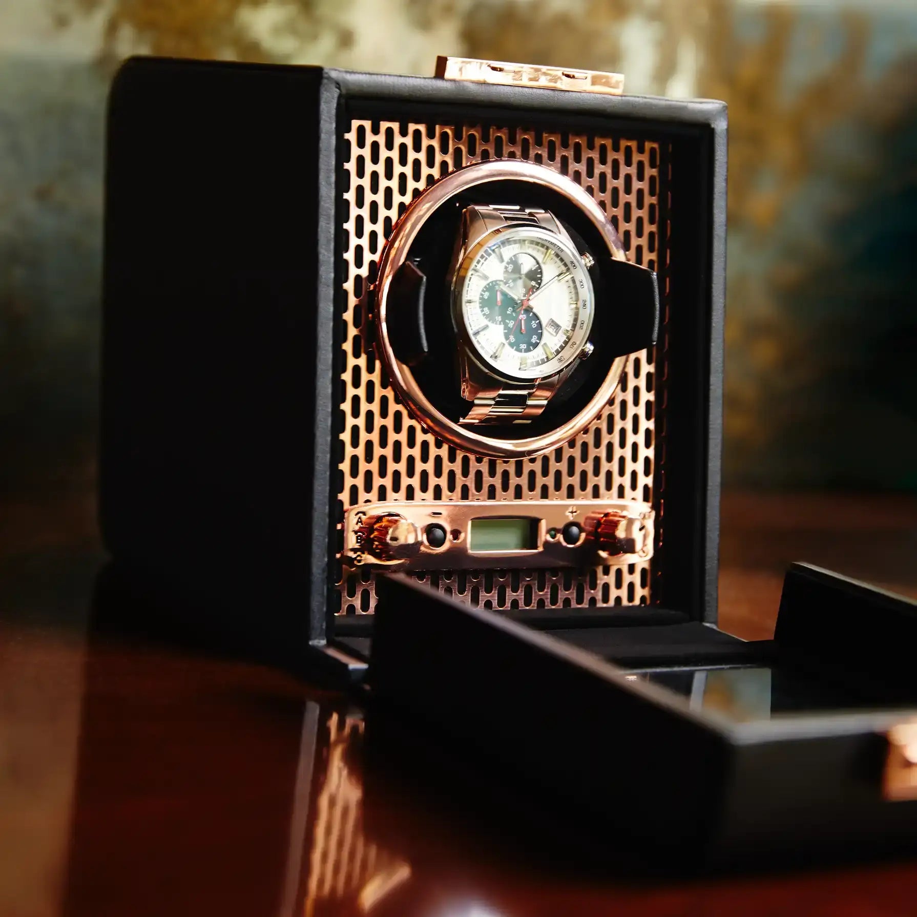 Automatic watch winder with a watch.