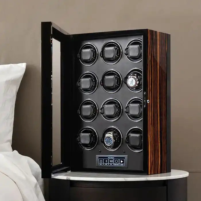 Wooden watch winder with multiple slots.